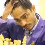 Aravindh Chithambaram Secures Sole Lead in Sharjah, Defeats Salem